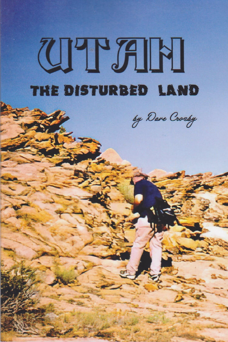 Utah The Disturbed Land, Image of a man in front of unusual rock formation.