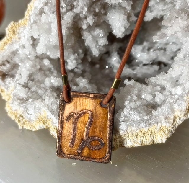 copper horoscope pendant