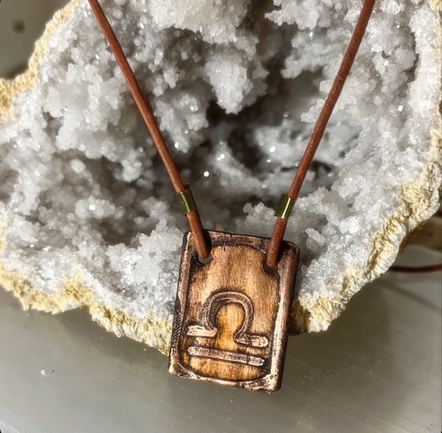 copper horoscope pendant