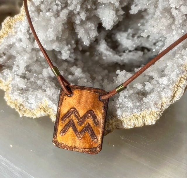 copper horoscope pendant