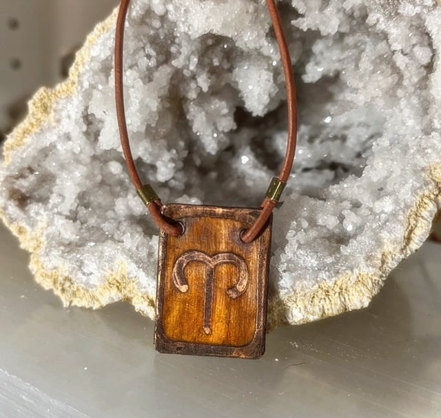 copper horoscope pendant