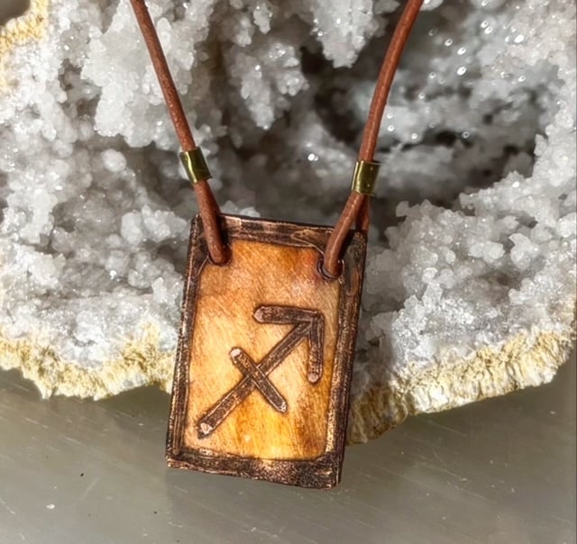 copper horoscope pendant