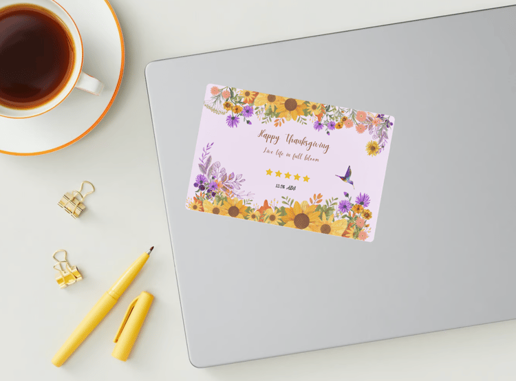 Customizable Vibrant Floral Abundance Sticker Label 6"x4" | Digital Canva Template. Mock sticker on laptop