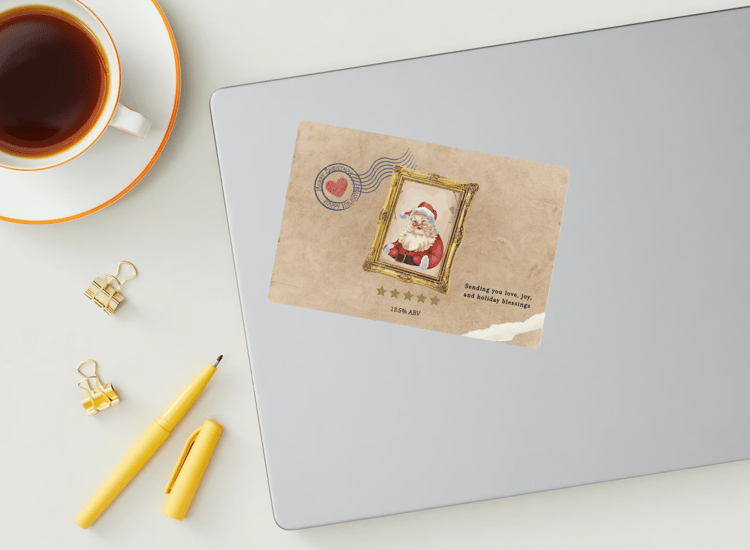Customizable Vintage Santa Postcard Sticker Label 6"x4" | Digital Canva Template. Mock sticker on laptop