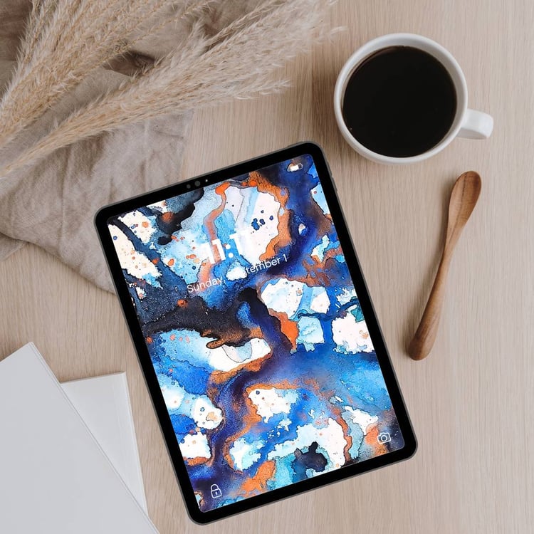 Abstract tablet wallpaper in bold blues, cobalt, and bronze tones, inspired by nebulae and cosmic exploration.