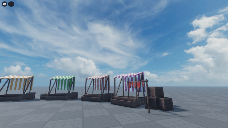 Roblox-ready free medieval decorations, including small props, tents, and a cozy campfire, perfect for immersive environments.