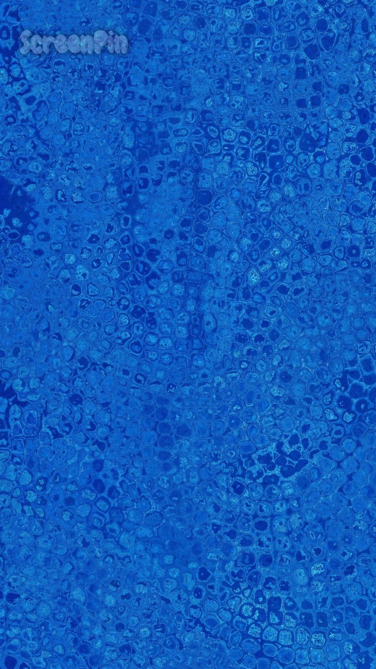 Deep blue textured abstract background with rich tones and subtle patterns. Ideal for digital art, modern designs, and creative projects.