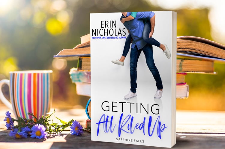 paperback cover of Getting All Riled Up by Erin Nicholas