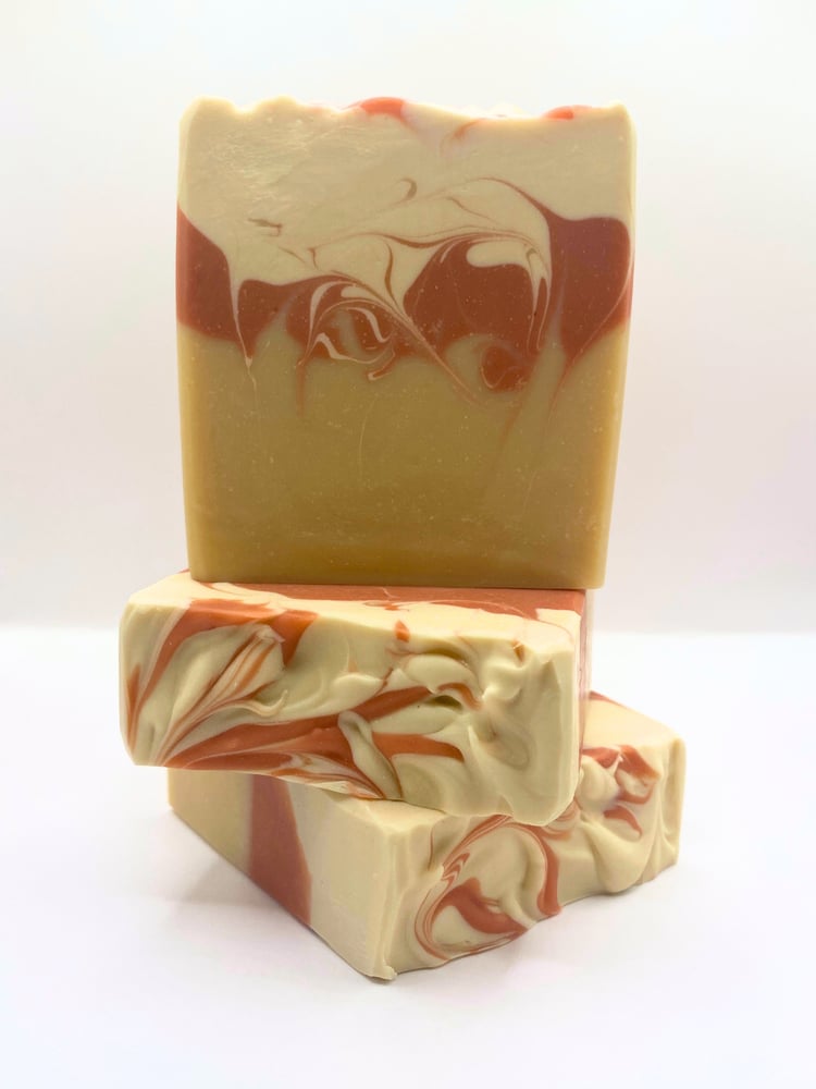 Handmade oat milk soap bars swirled with pink French clay