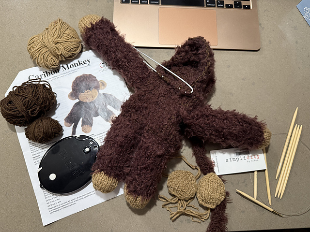A knitted monkey in progress