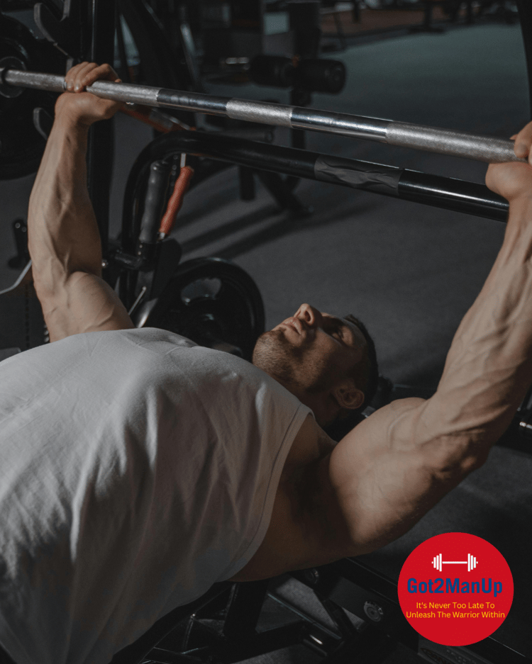 Hypertrophy training vs. failure training: A gym-goer lifting weights with controlled form, focusing on smart muscle growth for men over 40.