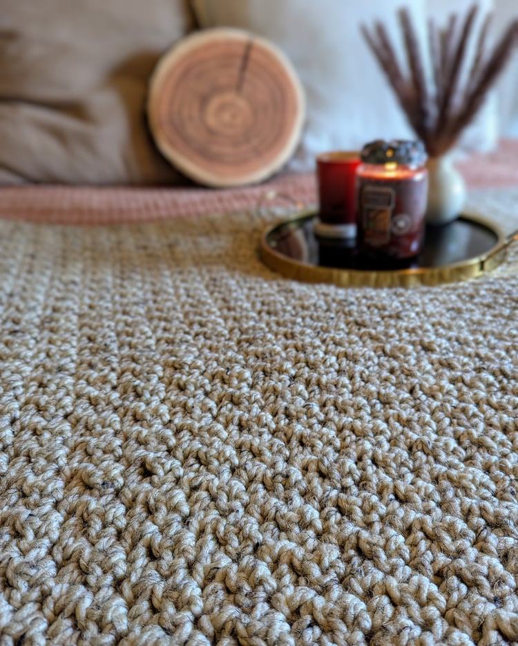 Fireside Throw Crochet Blanket Pattern on bed