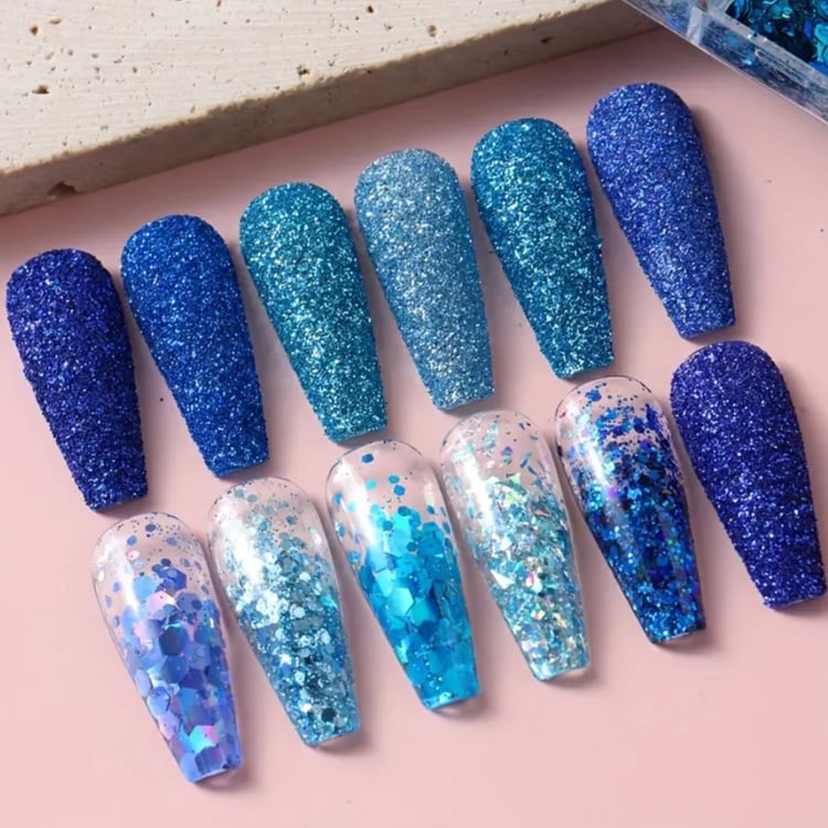 12 Grids Sparkly Blue Nail Glitter Set with 12 vibrant shades of blue glitter, perfect for creating dazzling nail art designs.