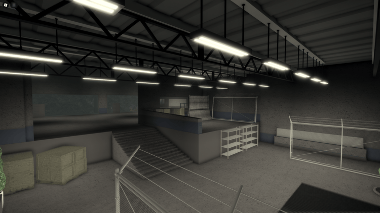 Aerial view of Area 21 Roblox map, featuring a vast military base with secure entrances.