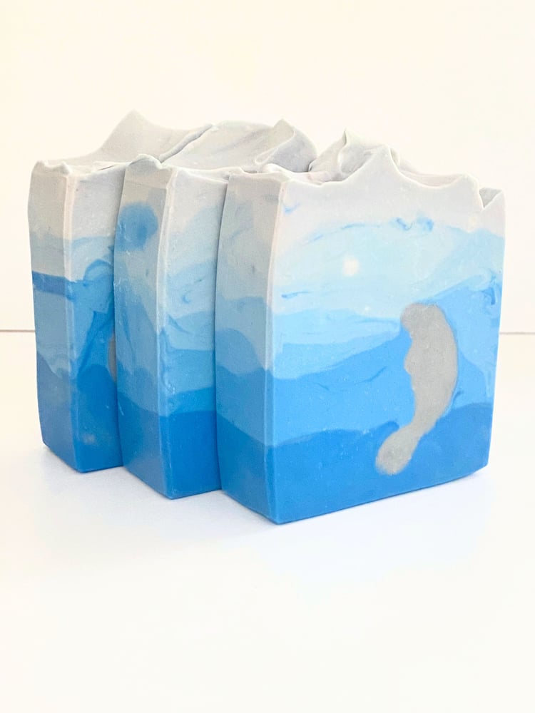 Stack of soap bars depicting a manatee under the water