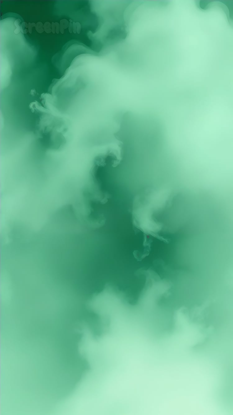 Abstract background with soft emerald green misty texture and cloudy, flowing formations, creating a dreamy watercolor atmosphere.
