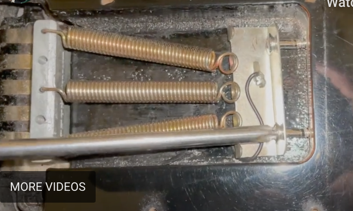 tremolo springs on an electric guitar