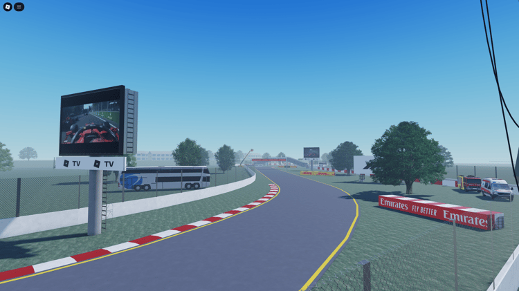 Cheering grandstands next to a race track in Roblox
