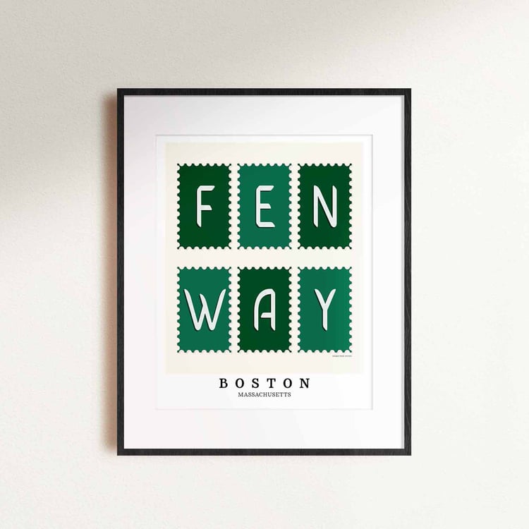 A framed picture of postage stamps featuring the Fenway neighborhood in Boston, Massachusetts drawn in a unique lettering style. Artwork has a green and white color scheme