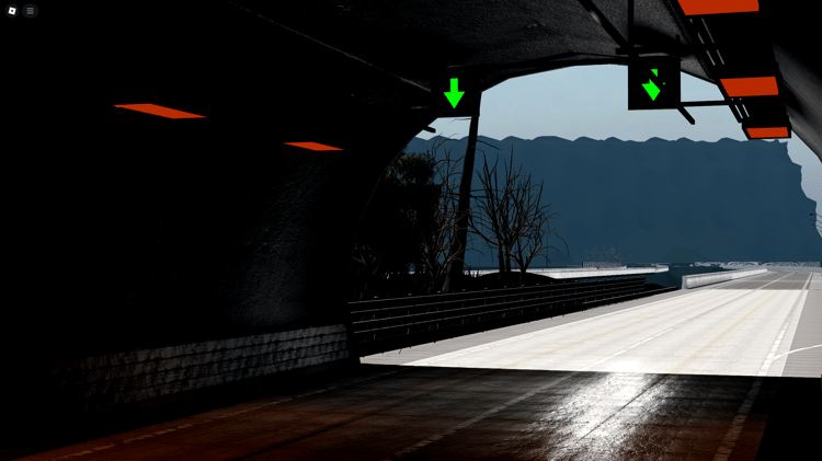 Long straight stretch of highway surrounded by scenic environment