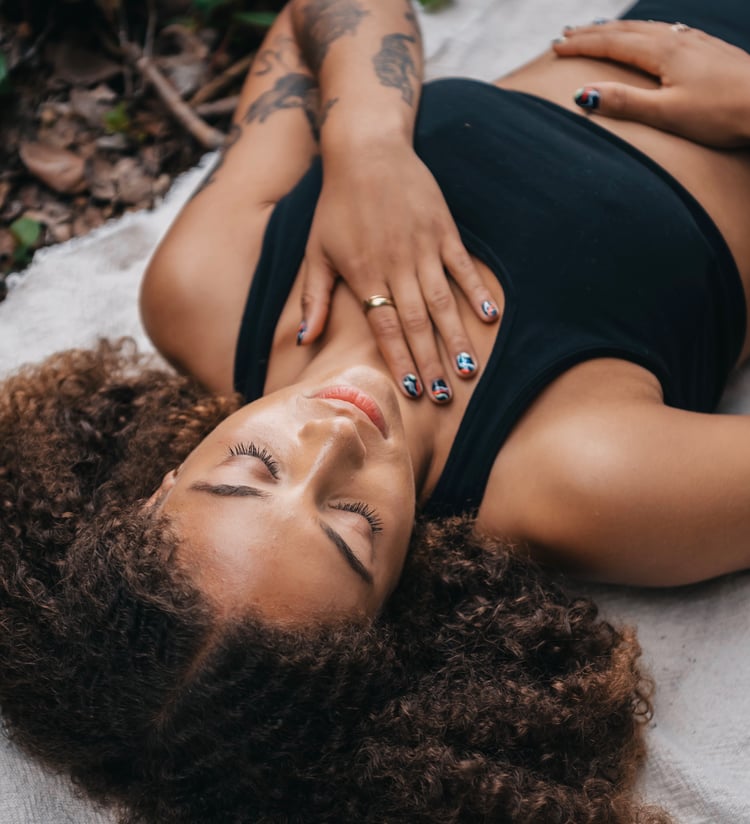 Woman is doing conscious breathing exercise