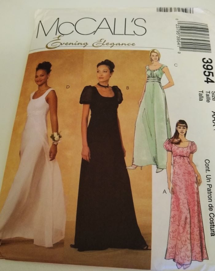 McCall’s 3954 Evening Elegance sewing pattern for Misses/Misses Petite formal dresses in sizes 4–10, featuring a fitted lined bodice, flared floor-length skirt, sleeveless or short-sleeved options, and optional overlay, shown on illustrated pattern envelope