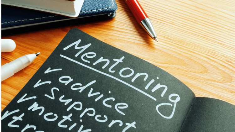 mentoring notebook  on desk