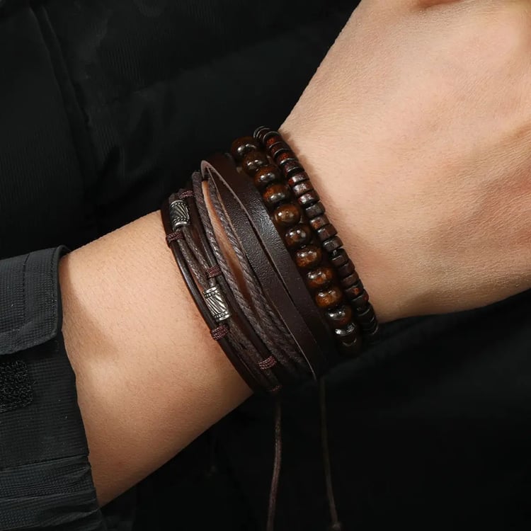 Mens 4pcs brown leather and wooden bead bracelet set, showcasing a variety of styles including round and disc wood beads, multi-strand leather cords with metal details, and layered leather straps. Adjustable handmade-style accessories.