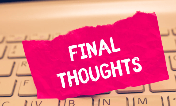 pink piece of paper with the words final thoughts written on it stuck in a keyboard.