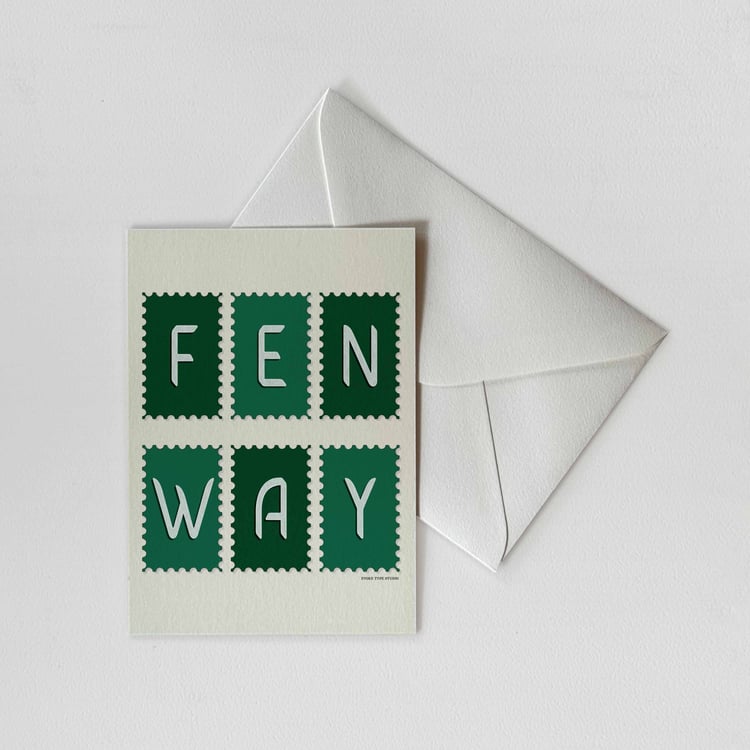 A notecard of postage stamps featuring the Fenway neighborhood in Boston, Massachusetts drawn in a unique lettering style with a white envelope. Artwork has a green and white color scheme