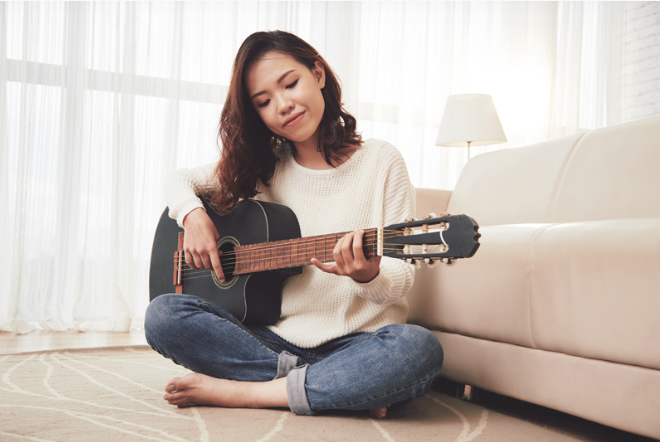 Song Playing On The Guitar
