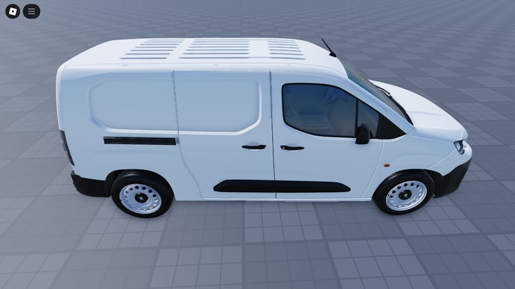 Side view of driveable Peugeot utility van