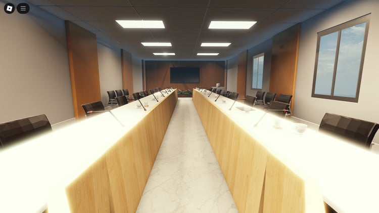 Large central meeting table with chairs in detailed Roblox government room build