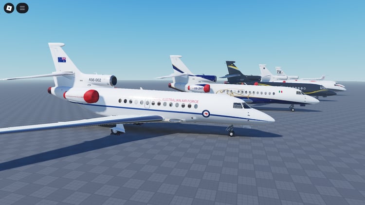 Side view of Falcon 7X with glossy body and tail markings
