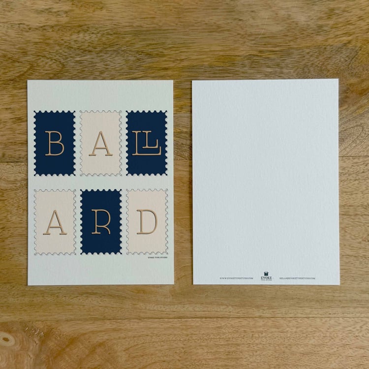 Two sides of a notecard, with postage stamp artwork on the front and a mostly blank back with company contact information at the bottom of the notecard.