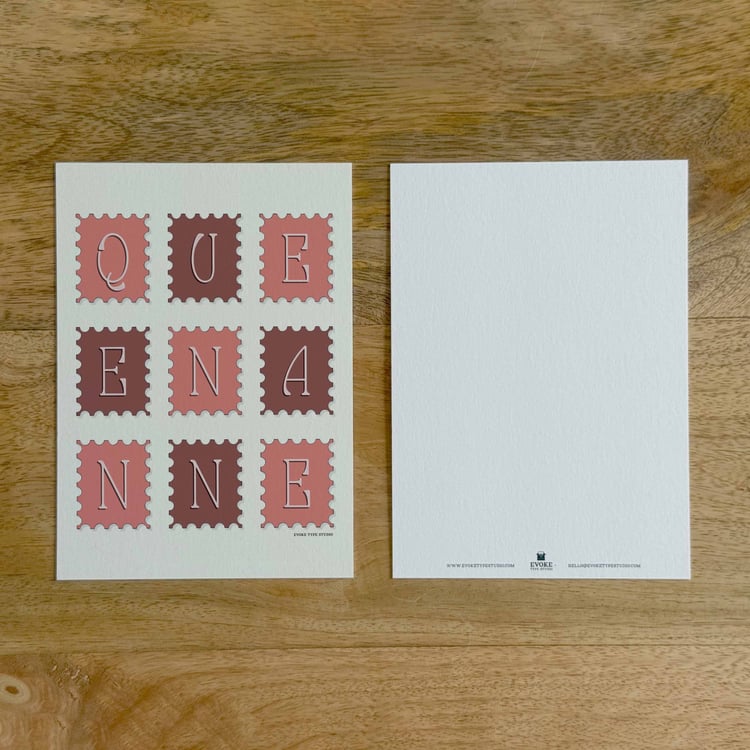 Two sides of a notecard, with postage stamp artwork on the front and a mostly blank back with company contact information at the bottom of the notecard.