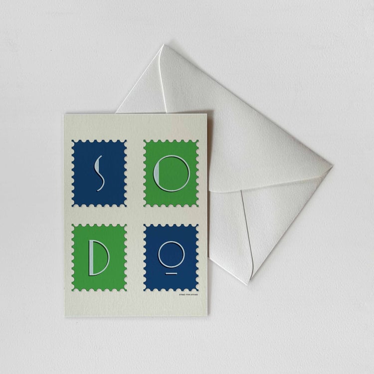 A notecard of postage stamps featuring the SoDo neighborhood in Seattle, Washington drawn in a unique lettering style with a white envelope. Artwork has a bright green and blue color scheme