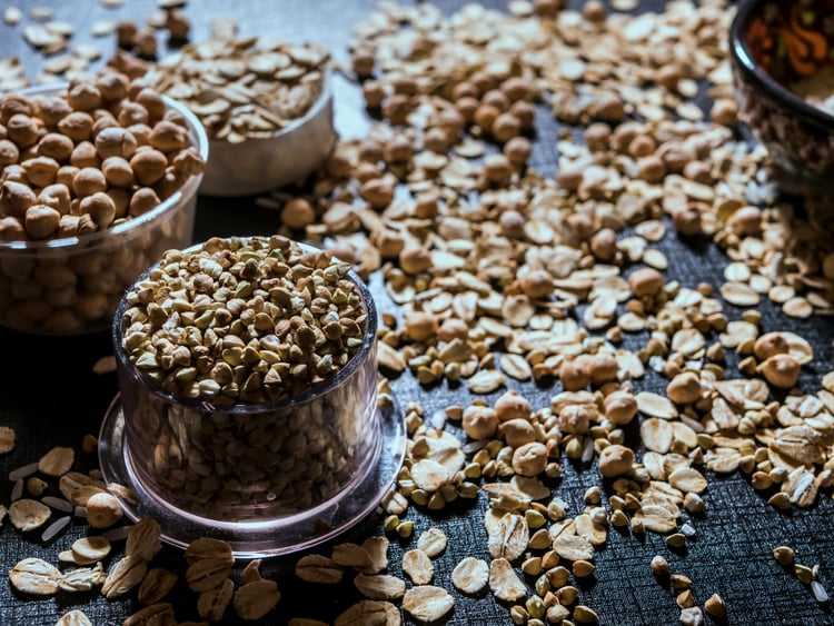 Quinoa, oats, and barley, whole grains to lower blood sugar and promote diabetes-friendly nutrition.