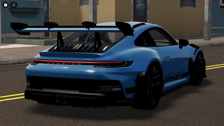 Player driving Porsche 911 GT3RS in Roblox