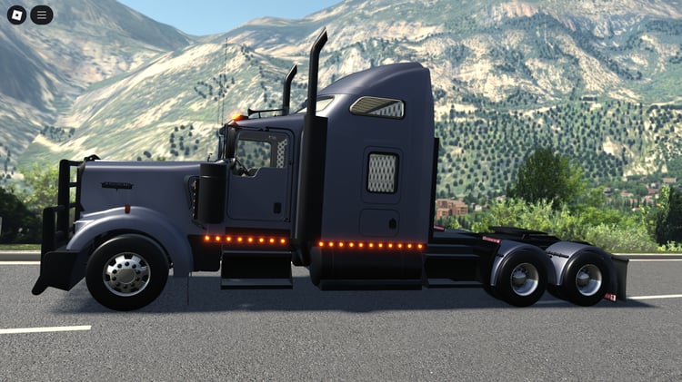 Side angle of the semi-truck showing 6x2 cab design