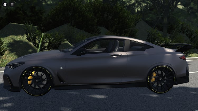 Side profile showing coupe design and styling