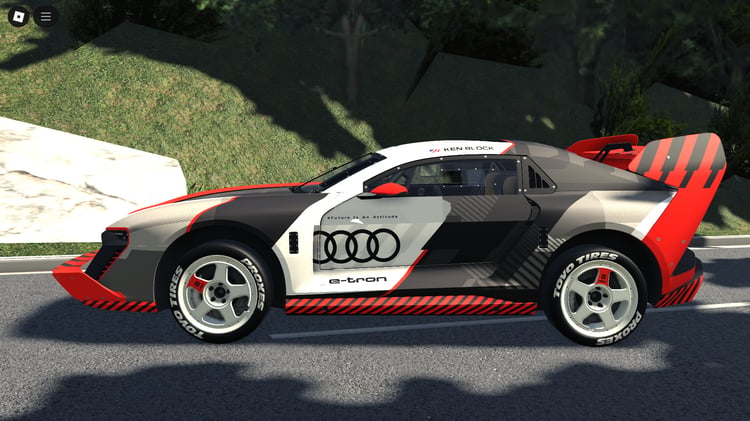 Side profile showing wide stance and aggressive styling