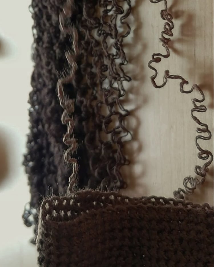 How to make marionette hair – unraveling darning yarn to create natural-looking afro curls for a puppet wig.