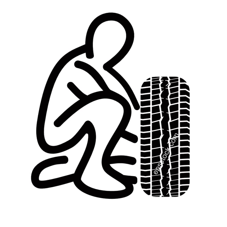 man changing tire