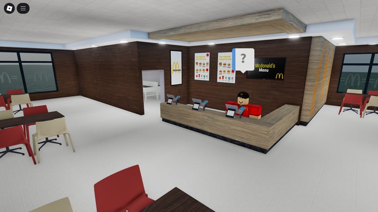 Interior seating area with tables and chairs