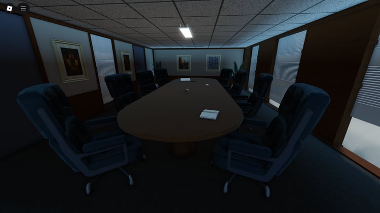 Meeting table with chairs arranged for discussion