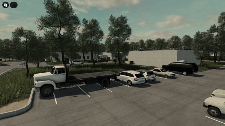 Warehouses surrounded by forest terrain
