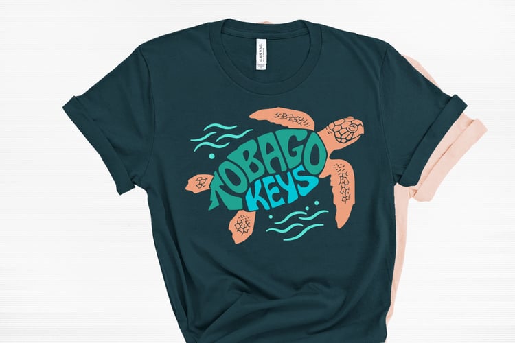 This design features the words Tobago Keys creatively made into the shape of a sea turtle.