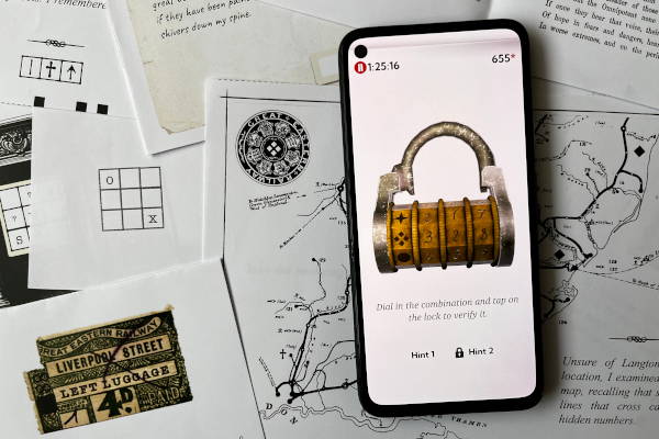 A smartphone displaying the companion app for 'The Secret of Langton Manor,' showing a vintage combination lock puzzle. The phone is resting on a collection of the game's printed materials, including a map and various paper clues.