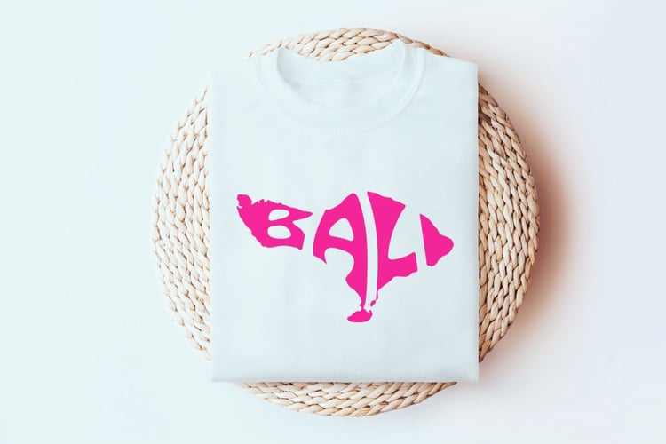 This design features the word 'Bali' seamlessly integrated into the silhouette of the island, perfect for anyone who loves this tropical paradise.